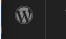 WordPress 로고가 있는 검은색 노트북