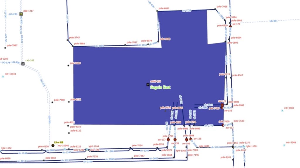 Map of a power distribution substation in blue and white with asset features labeled in red and blue