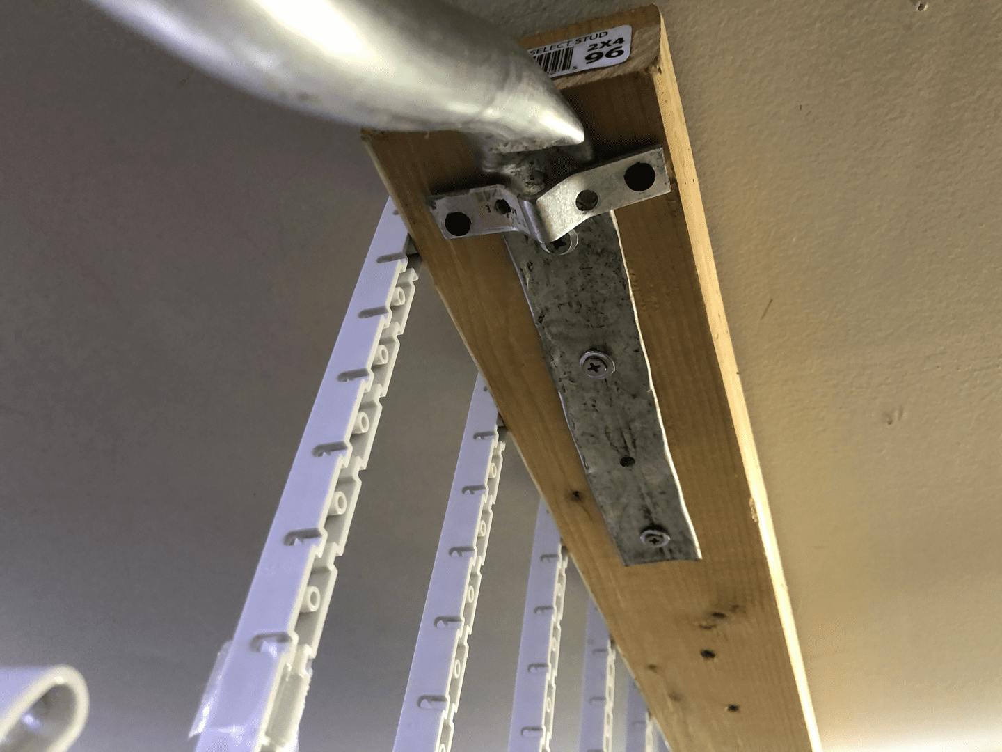 DIY ceiling mounted fishing Rod Rack from EMT and Makerpipe